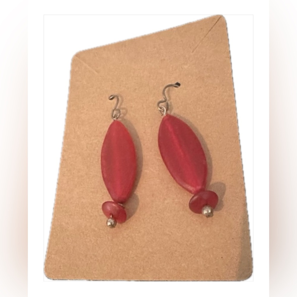 striking red oval-shaped bead earrings !